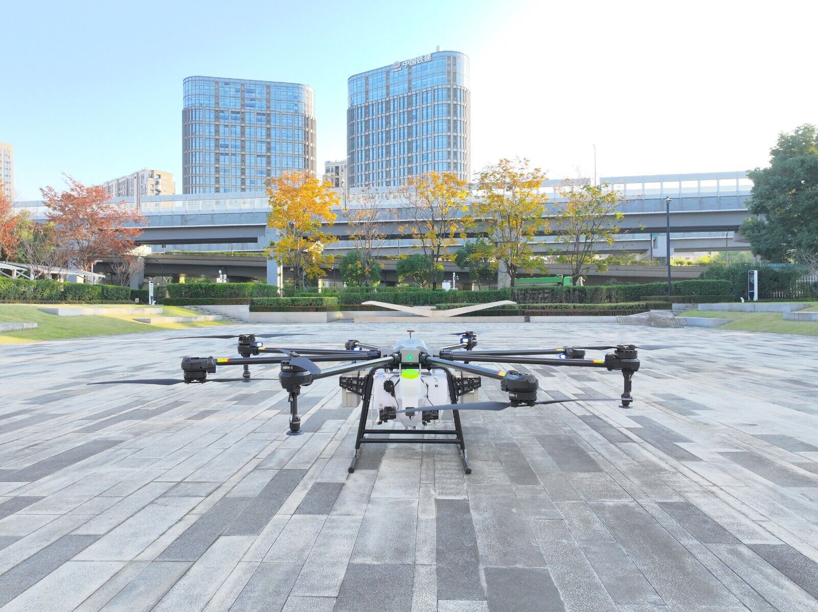 Agricultural spraying drone on a plaza